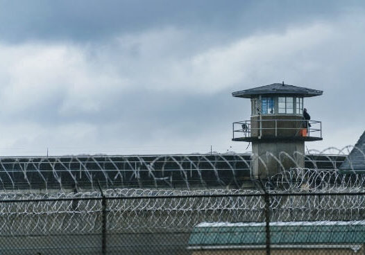 guard-tower-barbed-wire-fence